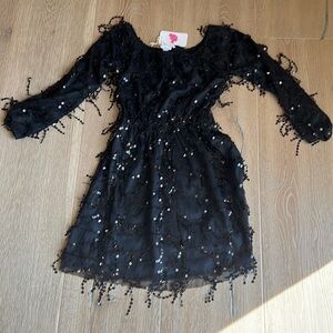 NWT perfect for your next occasion. Beaded Little black dress.L’Atiste by Amy